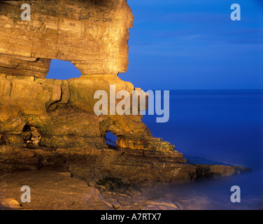 Limestone rock formation on the South Tyneside coastline in the North East of England. Known locally as Byers Hole. Stock Photo