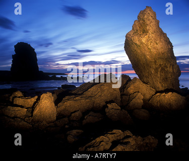 Darkness and Light. Twilight seascape at Marsden Bay on the South Tyneside coastline in the North East of England. Stock Photo
