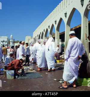 Group of people in a fish market Mutrah Muscat Oman Stock Photo