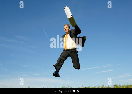 Businessman running in midair Stock Photo