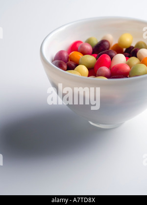 Close-up of colored candies in bowl Stock Photo