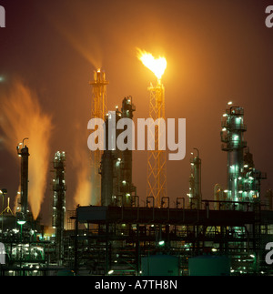 Oil refinery lit up at night Stock Photo