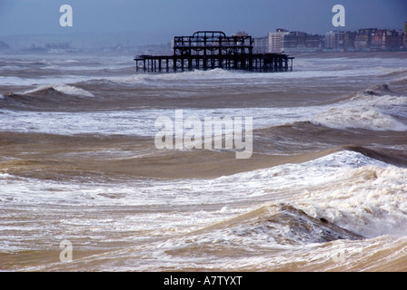 Breaking waves on beach, Sussex, England Stock Photo