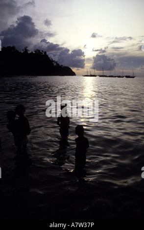 Children in the sea Run Island Banda Islands Moluccas islands Indonesia Stock Photo