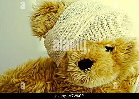 Teddy Bear with bandaged head Stock Photo