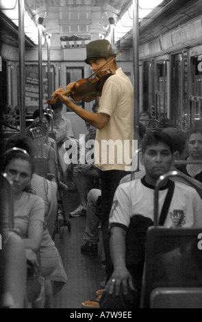 Busker on the Metro Paris Stock Photo