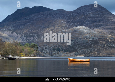 Slioch, a munro mountain, towers over Loch Maree in Wester Ross,Scotland ,in the United Kingdom Stock Photo