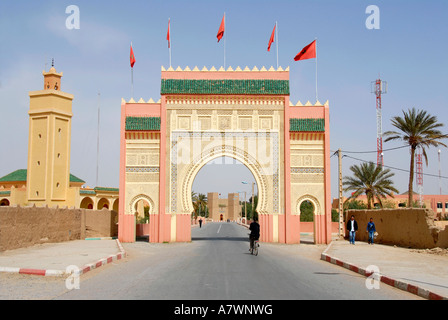 Modern oriental city gate of Rissani with minaret and palm tree Morocco Stock Photo