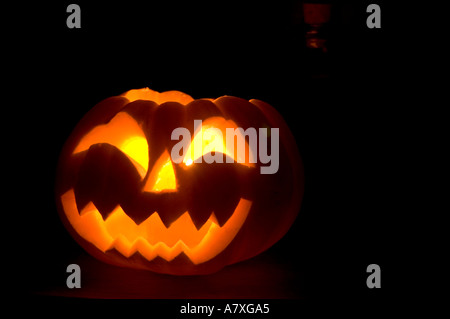 pumpkin blue eyes halloween moody scary dark dramatic orange pumpkin halloween jack o lantern moody dark scary evil halloween oc Stock Photo