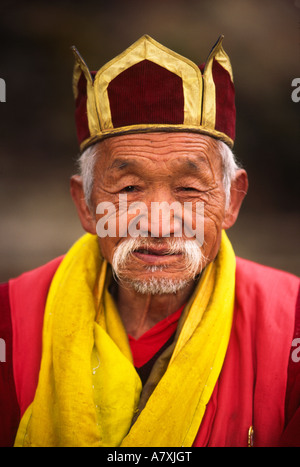 Asia, China, Yunnan Province, Lijiang. Monk of Tibetan Red Hat Buddhist sect portrait; Yufeng Monastery Stock Photo