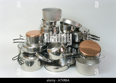Stainless steel, aluminium and copper-bottomed pots and pans for camping Stock Photo