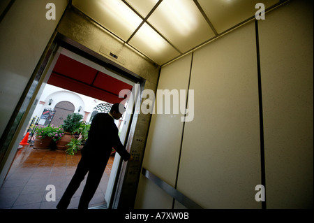 Man/businessman in a lift/elevator Stock Photo
