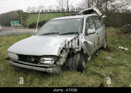 road traffic accident with crashed car on a roundabout outside Letterkenny County Donegal Republic of Ireland Stock Photo