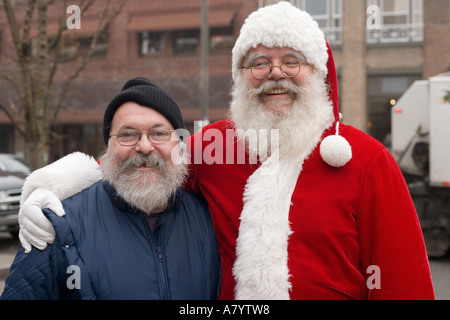 Santa Claus finds his long lost brother in Seattle Stock Photo
