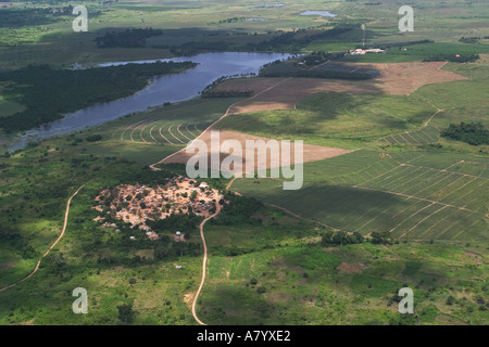 Aerial view of small village providing workers to the surrounding market garden growing fruit and vegetables area near capital Accra Ghana West Africa Stock Photo