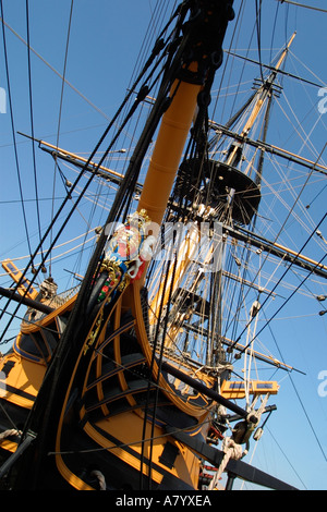 HMS Victory,world's oldest naval ship and famous104 gun warship in Historic Portsmouth Dockyard. Bow showing figurehead and coat of arms. England UK Stock Photo