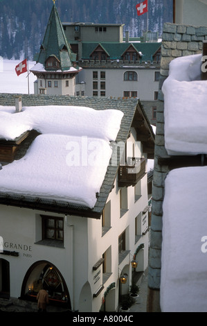 Switzerland St Moritz view across snow covered roofs toward Palace Hotel Stock Photo