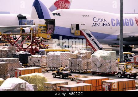China, Hong Kong, Chek Lap Kok airport, tarmac, cargo plane, merchandise transportation Stock Photo