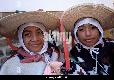 Mexico, Michoacan State, Patzcuaro Town, young dancers and musicians into the Casa de los once patios Stock Photo