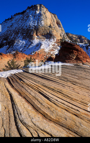 Afternoon light on snow dusted sandstone formations in upper Zion Canyon Zion National Park Utah Stock Photo