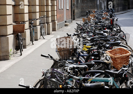 Bicycles parked at the side of a road in Cambridge UK Stock Photo