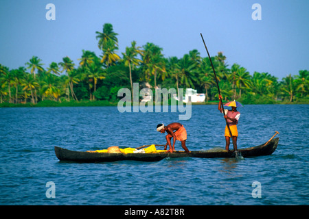 Typical houseboat on a canal, Kerala backwaters at dusk 