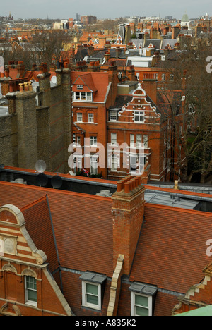 London skyline Victorian mansion block roof tops looking north from Chelsea London Stock Photo