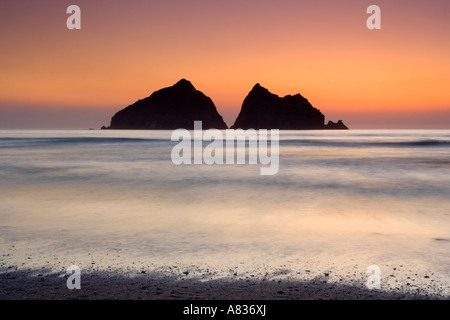 The rocks know as Carters or Gull Rocks off the beach at Holywell Bay Cornwall UK Stock Photo