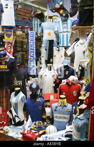 Sports shop shop window in Buenos Aires Argentina displaying football  clothing Stock Photo - Alamy