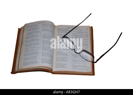 Eyeglasses on opened  Antique Leather Bound Longfellow Poetry Book Stock Photo