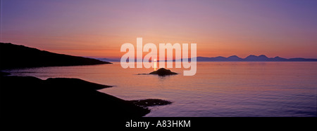 Golden Sunset over Islay and Jura from West Loch Tarbert on the Kintyre Peninsula Scotland UK  GPAN 0062 Stock Photo