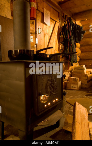 Cooking on the wood burning stove Snowshoe cabin Snowshoe Country Lodge Isabella Minnesota Stock Photo