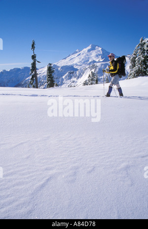 Man snowshoeing in mountains Washington Cascade Mountains Stock Photo