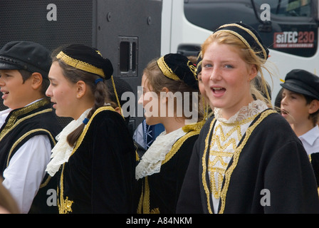 Australian children of Greek descent celebrate at a festival in traditional costume Stock Photo