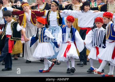 Australians of Greek descent celebrate at a festival with dancing in traditional costume Stock Photo