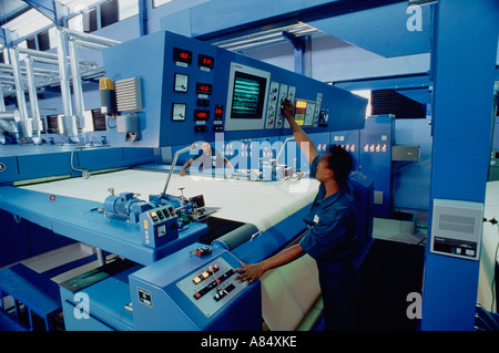 Indonesia. Manufacturing industry. Textiles factory worker machine operators. Stock Photo