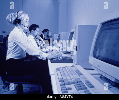 Call center telephone operators. Stock Photo
