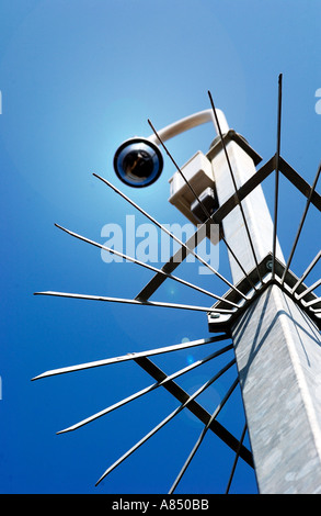 Security camera on top of mast with protective spikes Stock Photo - Alamy
