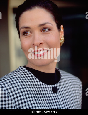 Young woman close-up portrait outside city building. Stock Photo