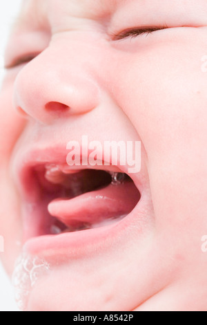 Baby Crying Beacuse of Teeth Stock Photo