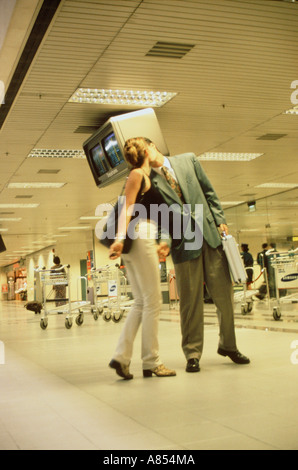 Young couple saying goodbye at airport. Stock Photo