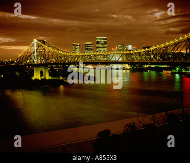 Australia. Queensland. Brisbane. City overview at dusk with Story Bridge over Brisbane River. Stock Photo