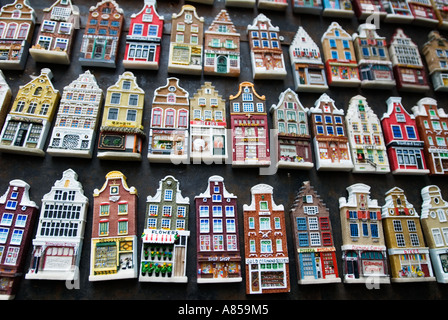 Colourful small Amsterdam houses for use as fridge magnets for sale in tourist shop Stock Photo