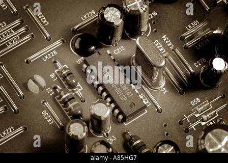 Close up of microchips and various electronic components on a circuit board Stock Photo