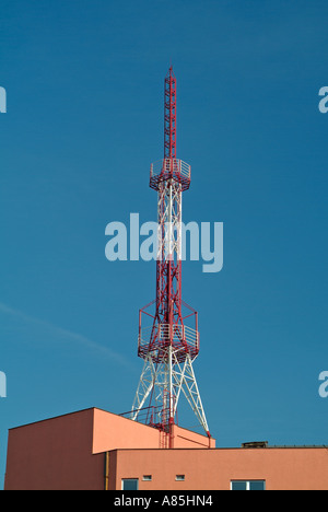 Transmitter Mast on Top of a Building Stock Photo
