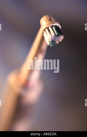 Electric tooth brushes on white background Stock Photo - Alamy