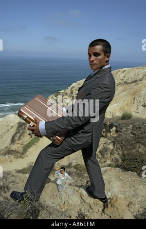View of a man holding a briefcase. Stock Photo