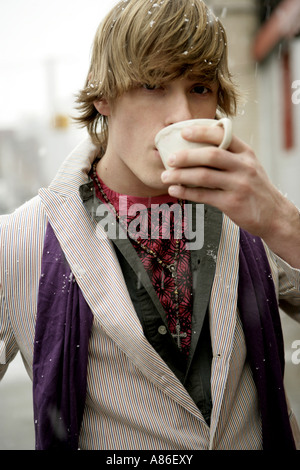 Man drinking beverage, close-up Stock Photo