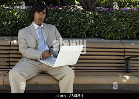 View of an executive working on a laptop. Stock Photo