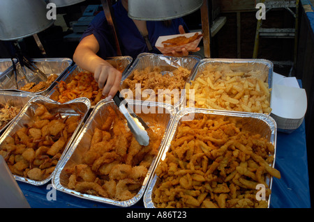 A stand selling fried fish at the Ninth Avenue Food Festival  Stock Photo